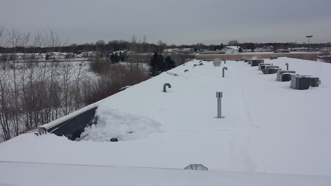 Understanding the Weight Your Commercial Roof Can Handle